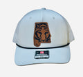 White cap with a tiger logo on a white background